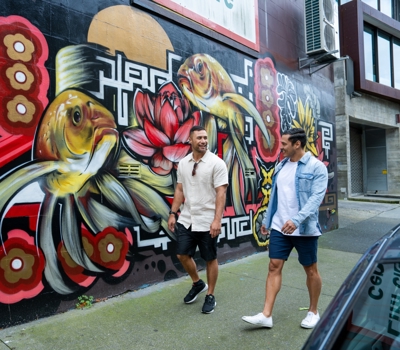 men walking on cross street